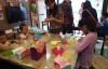 巴渝公益组织国贸中心白领家庭开展DIY月饼亲子活动