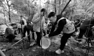 【公益时报】志愿者为大熊猫备“口粮”
